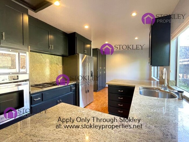 Building Photo - Stokley Properties Presents 417 Wovenwood ...