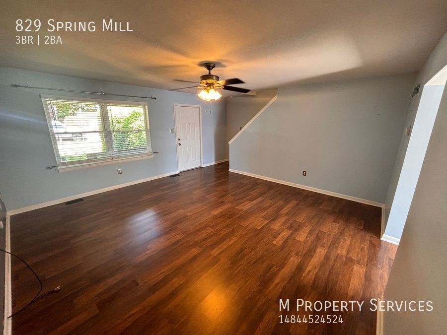 Primary Photo - Charming 3BR/1.5BA End Unit Townhome in Co...