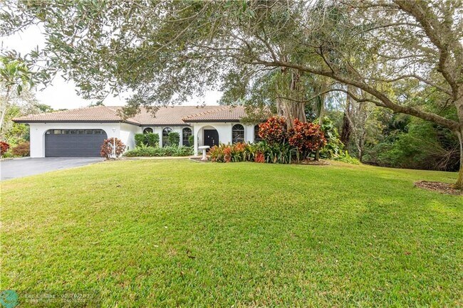 Building Photo - 4490 SW 105th Ave