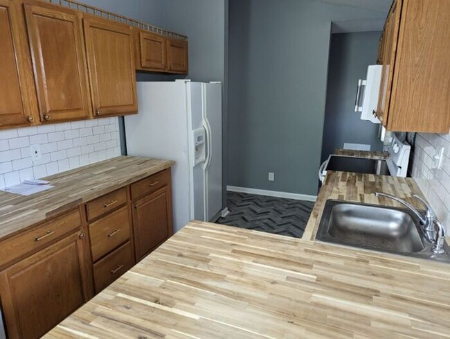 Building Photo - Beautifully Remodeled Three Bedroom Home w...