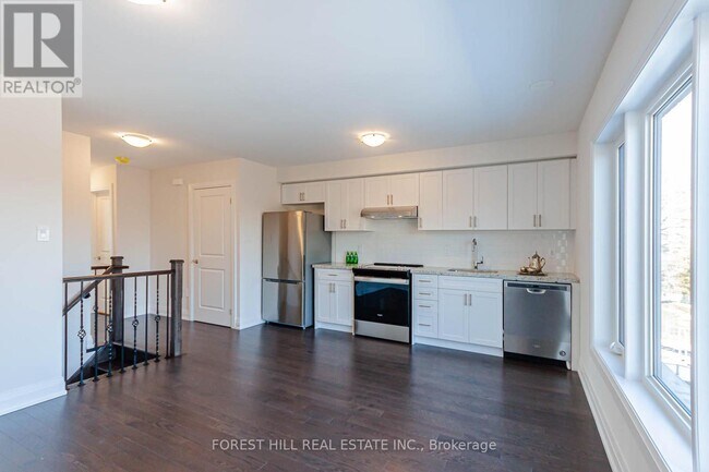 Photo du bâtiment - 37 Wild Rose Gardens