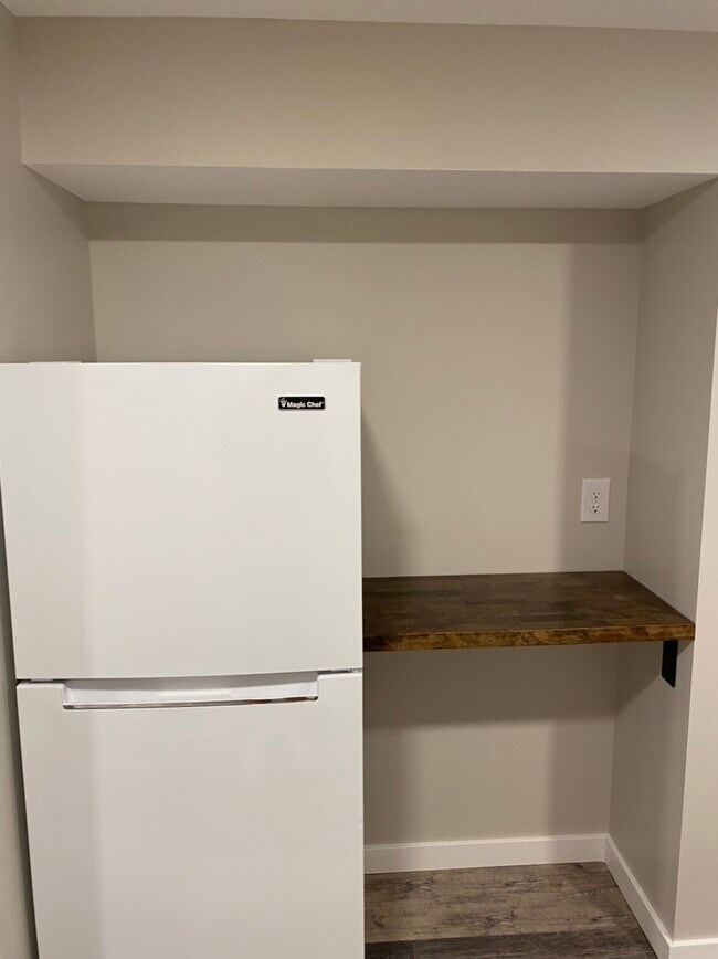 Refrigerator & Shelving - 147 8th Ave N