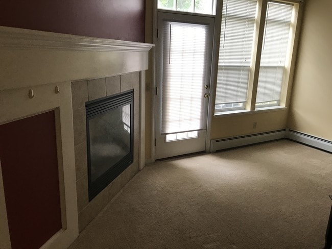 Living room with fireplace - 131 Stonington Cir