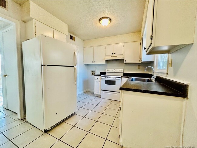 Building Photo - 2127 Grand Prix Dr