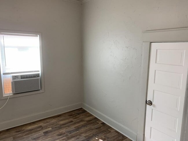 Building Photo - 208 E. Springer
