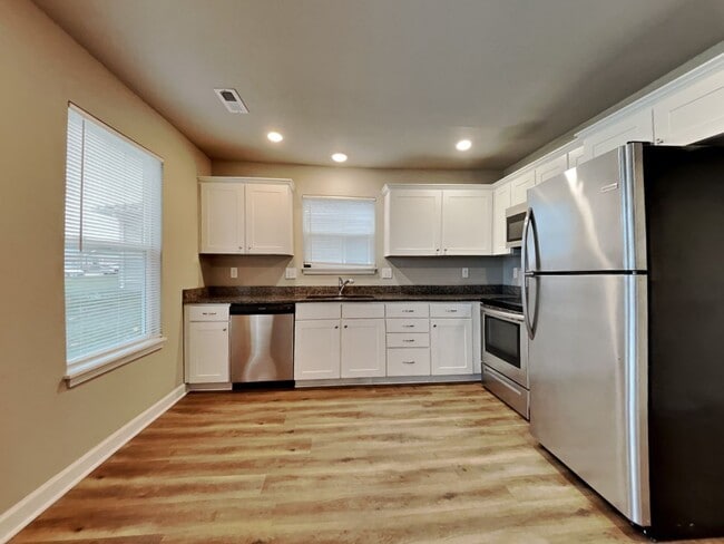 Building Photo - Spacious 3-Bedroom Home with Hardwood Floors & Patio in Blue Springs, MO