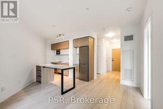 Building Photo - 1-601 Belsize Dr