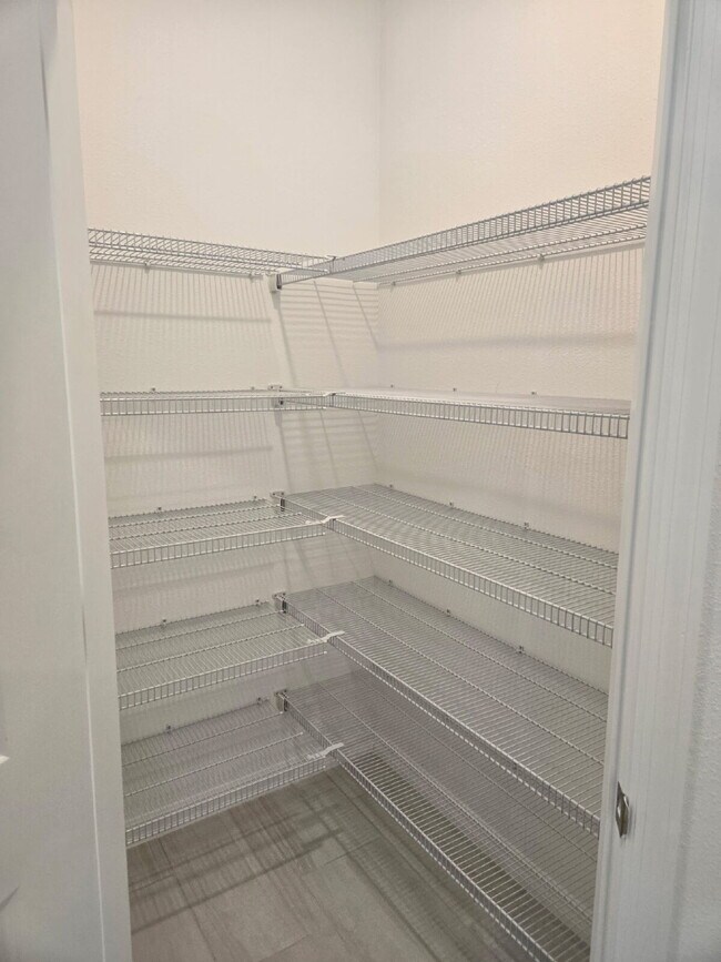 Foto del edificio - "Charming 3-Bed Oasis with Modern Granite Touches in Land O' Lakes!"