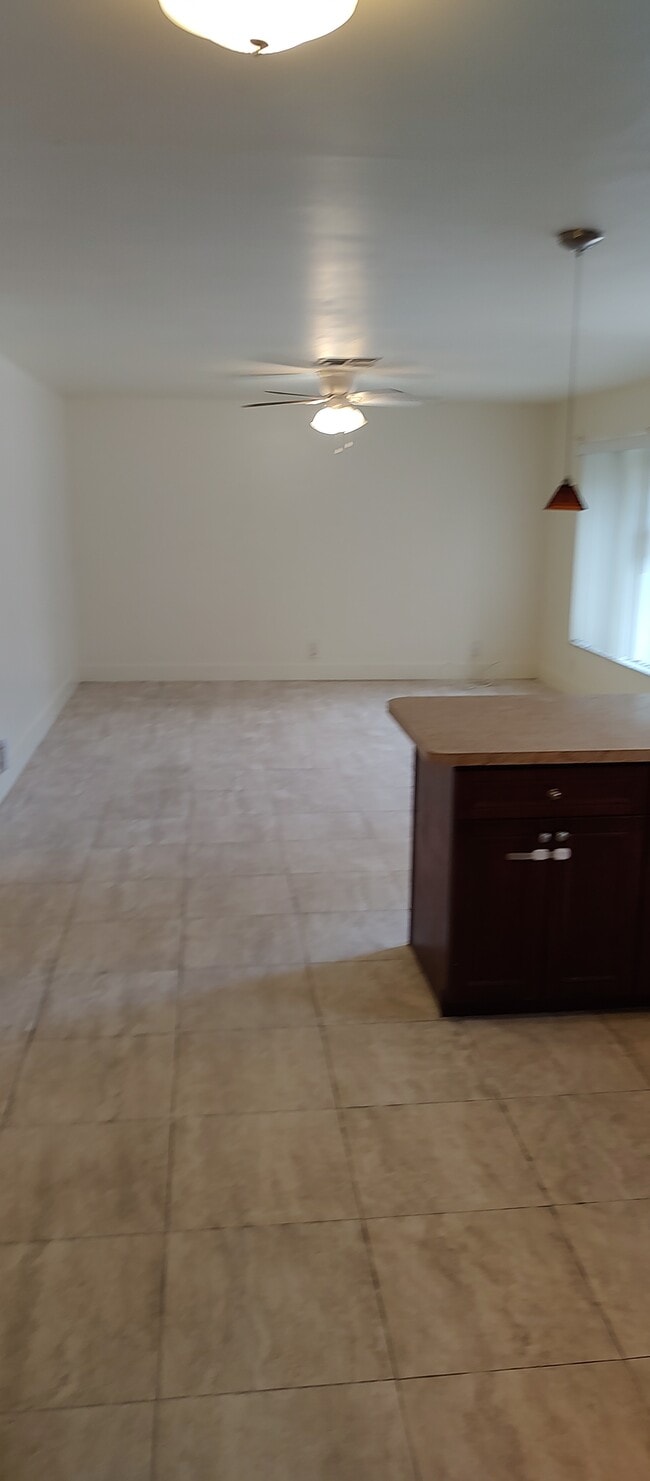kitchen and living room open floor plan - 12126 Gibbs Rd Apartments