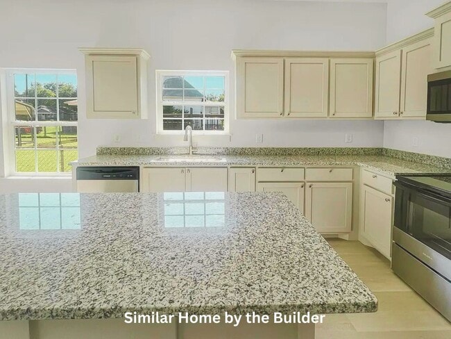 Building Photo - Modern & Brand-New Duplex w/ Major Appliances Included!