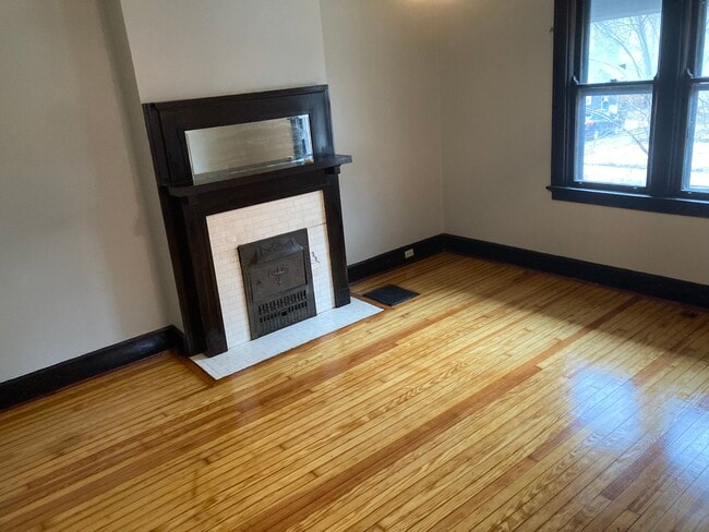 living room with Victorian fireplace - 1122 Holman Ave