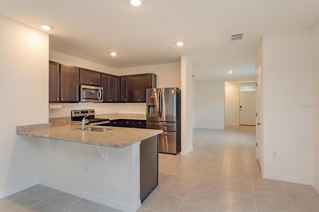 Foto del edificio - 2407 Ribbon Fall Ave