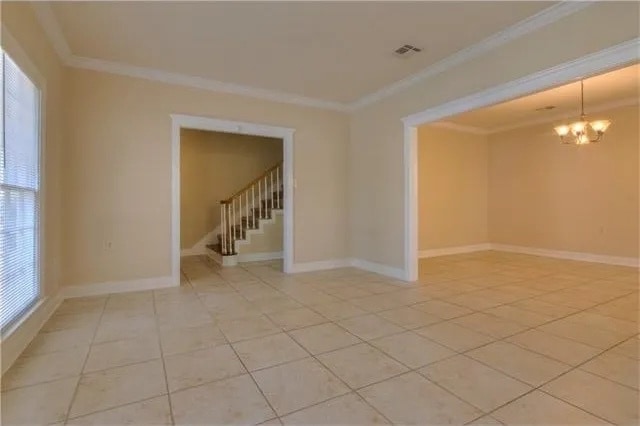 Living room looking toward adjoining townhouse (north) - 95 Versailles Blvd