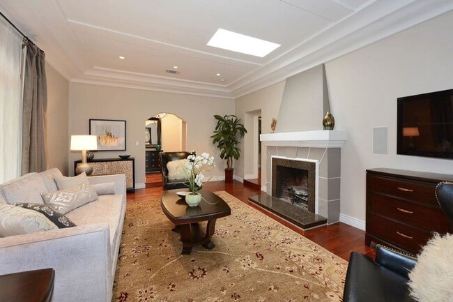 Building Photo - Welcome to this beautifully updated Spanis...