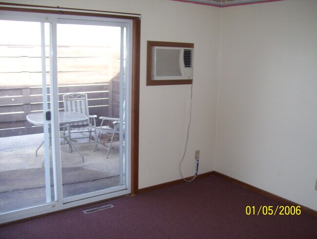 In unit A/C and patio - 127 N Walworth St