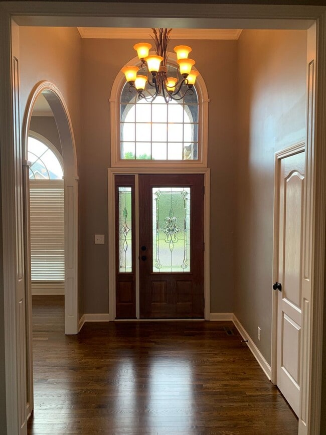 Building Photo - Luxury Living! Beautiful Brick Home in Sango with 3 car garage.