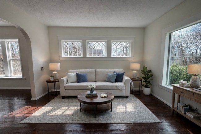 Building Photo - Charming Multi-Level Akron Home with Huge Living Room & Updated Siding