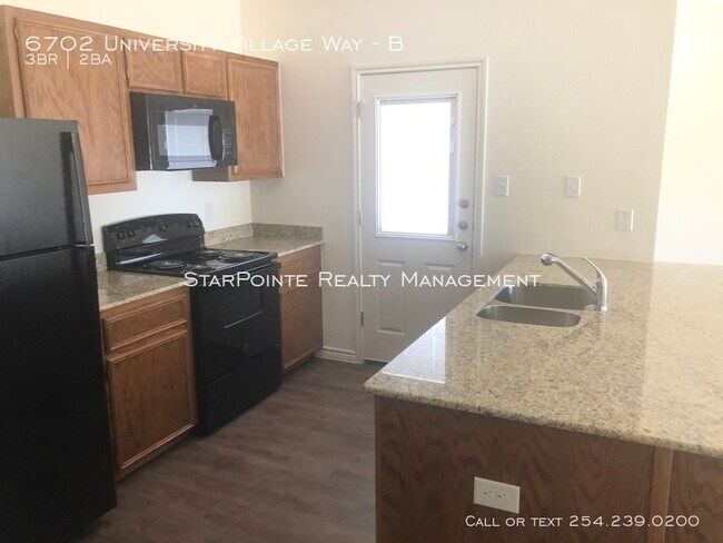 Foto del edificio - 6702 University Village Way Apt. B