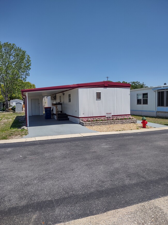 Building Photo - 7402 Demure Ln
