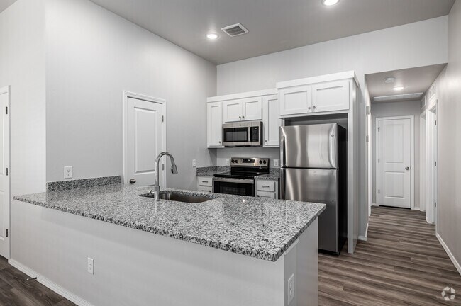 B - 4 habitaciones, 2 baños - 1240 pies cuadrados - Cocina - Enclave Estates at Chickasha