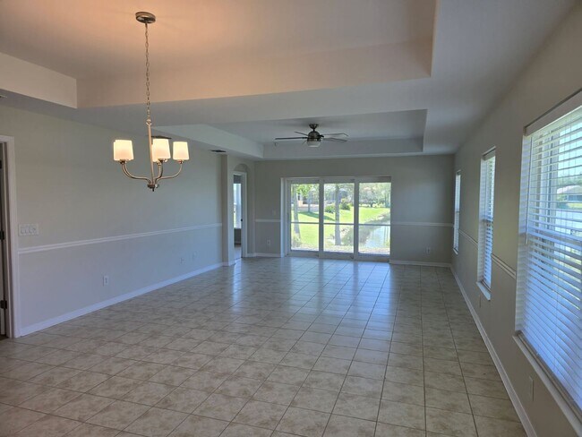 Building Photo - Stunning Lakefront Home with Magnificent Unobstructed Water View