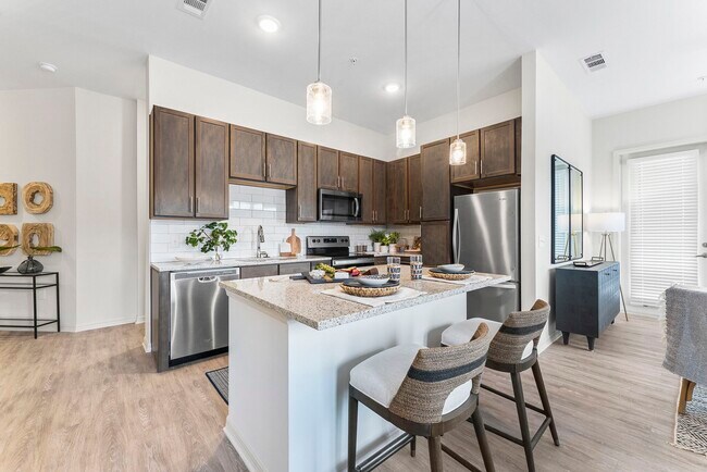 Building Photo - The Reef Apartments