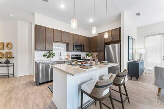 Building Photo - The Reef Apartments