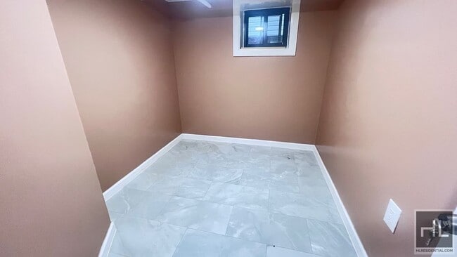 Building Photo - FRESHLY RENOVATED  2 BEDROOMS SEMI- BASEME...