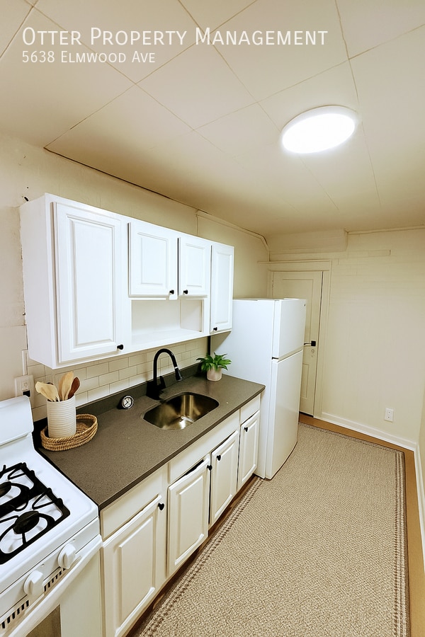 Building Photo - 5638 Elmwood Ave