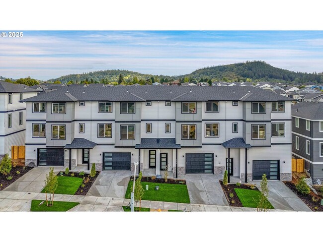 Foto del edificio - Spacious and Light-Filled Newly Built Condo Offering an Open Layout, Island Kitchen, and Outdoor ...