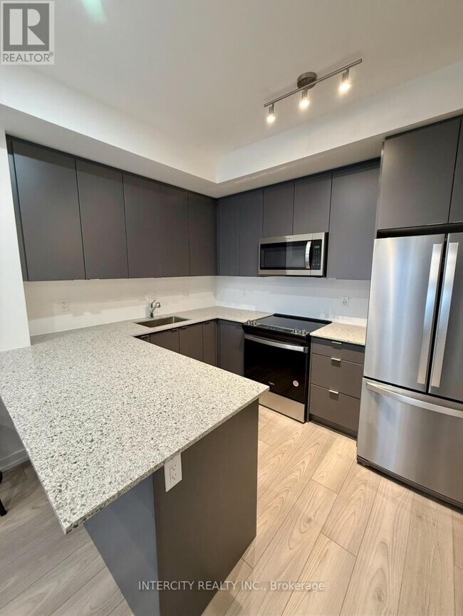 Photo du bâtiment - 18 Lytham Grn Cir