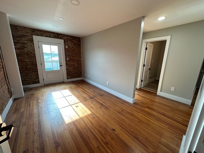 Building Photo - Private Balcony Living Above It All