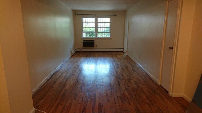 Living room overlooking backyard - 6130 Booth St