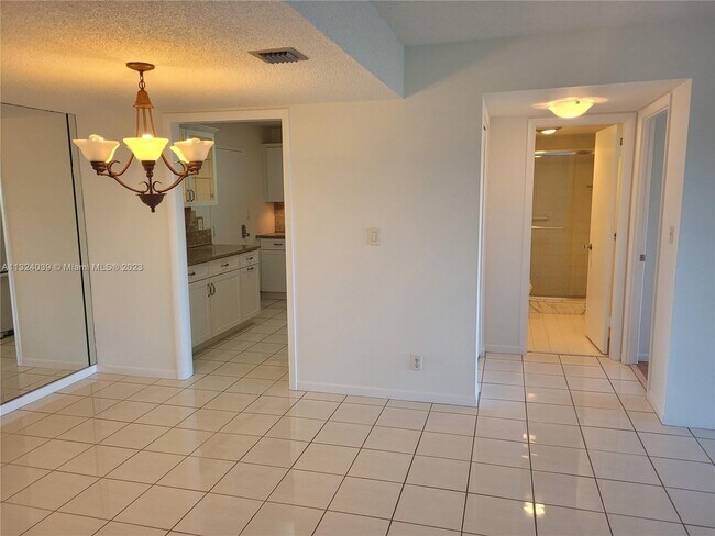 Building Photo - 10777 W Sample Rd