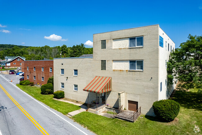 Building Photo - Wehnwood Court Student Living