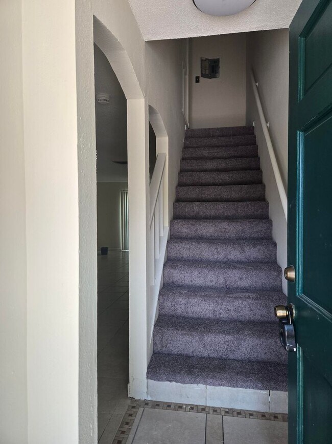 Building Photo - Palms West Condo- Ozkal