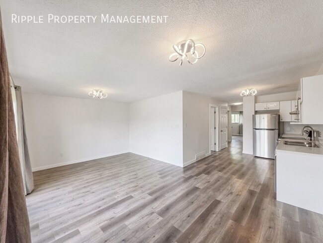 Building Photo - SPACIOUS 3 BEDS, 1 BATH DUPLEX | BRIGHT & COZY HOME IN CONVENIENT SE CALGARY