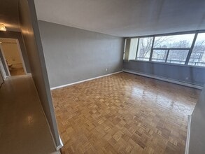 Building Photo - 1061 Queen's Blvd