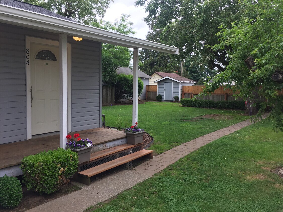 Large private fenced yard with storage shed - 804 Edson St.