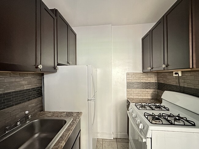 Building Photo - 1363 W Estes Ave