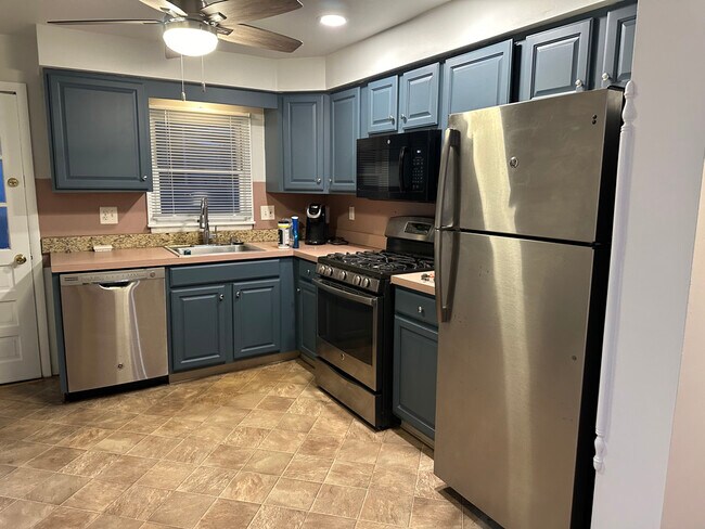 GE appliances, newly painted wood cabinets and new shades - 2318 S Carlisle St
