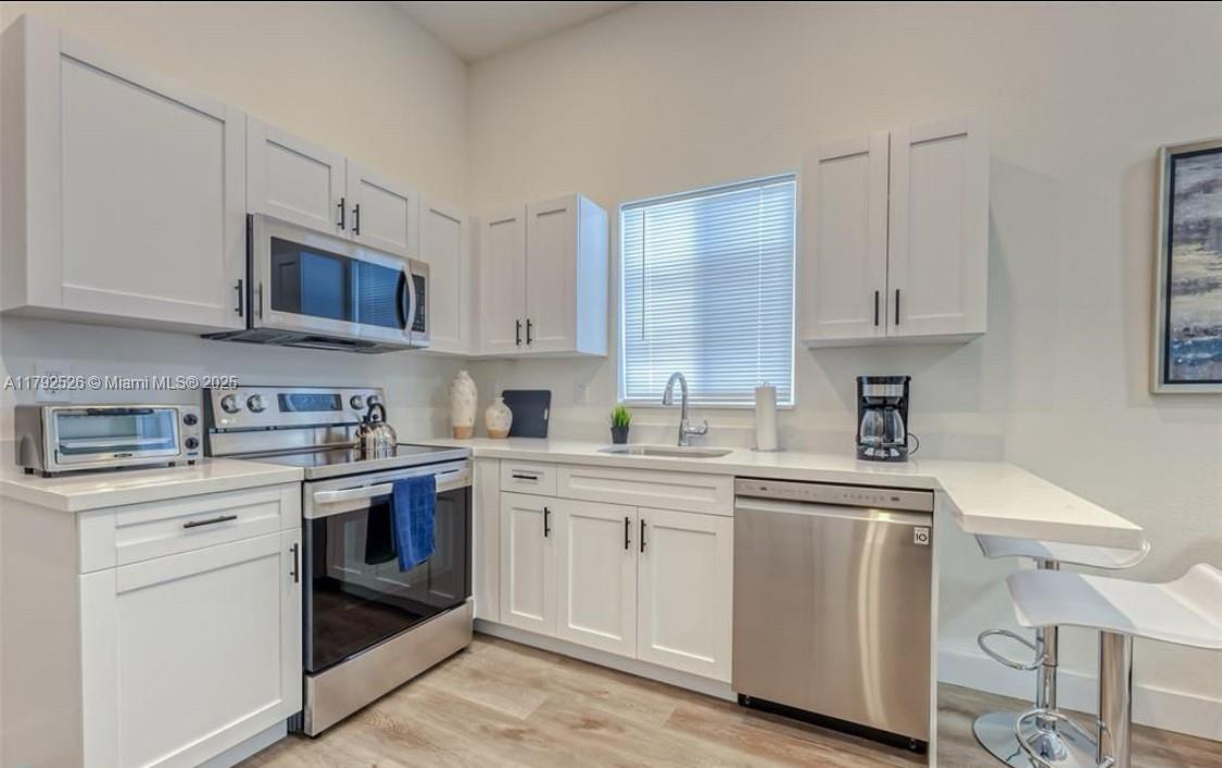 Foto principal - 830 SE 14th St
