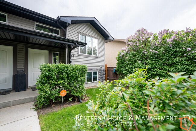 Photo du bâtiment - 2 Bedroom Duplex Close To Schools and Shopping
