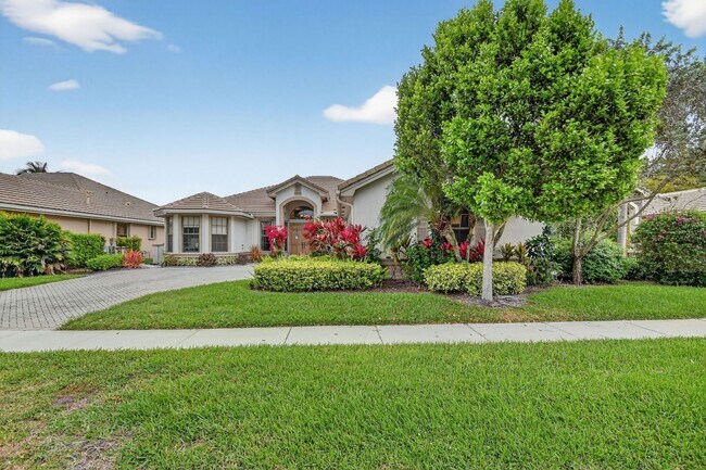 Building Photo - Stunning 5-Bedroom Home in the Prestigious Versailles Community | Wellington, FL