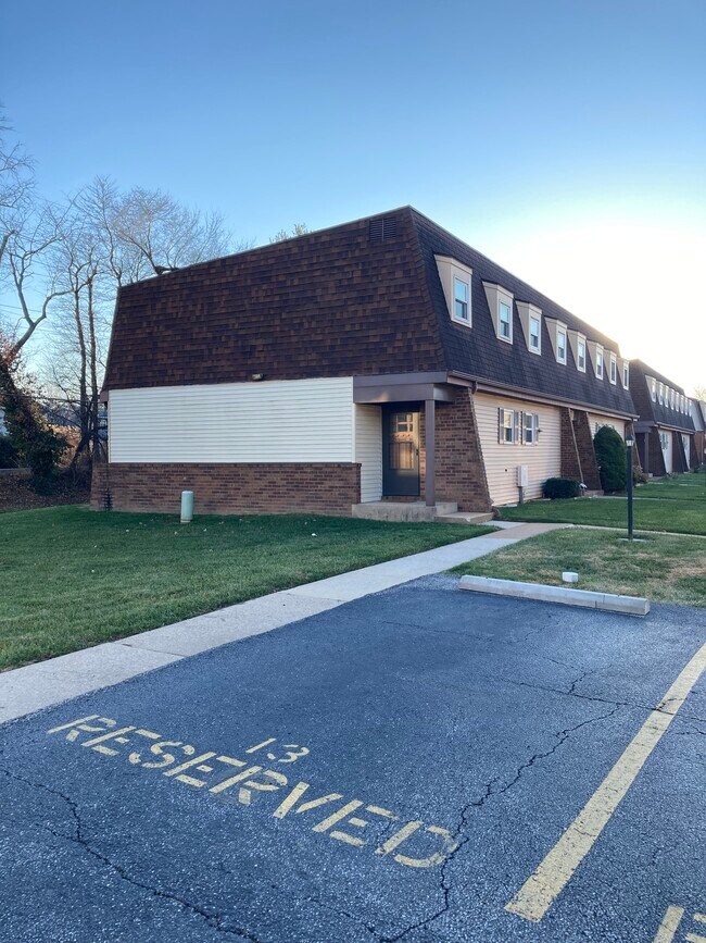 Front door to corner condo, featuring 1 of 2 parking spots - 13 Dorset Ct