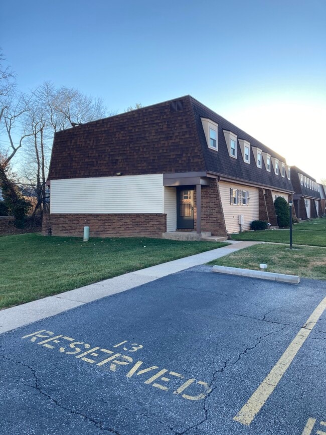 Front door to corner condo, featuring 1 of 2 parking spots - 13 Dorset Ct