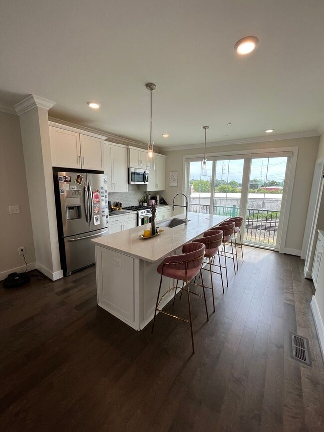 Building Photo - Stunning 2BD*, 3.5BA Raleigh Townhome with Bonus Office/Den on First Floor and 2-Car Attached Garage