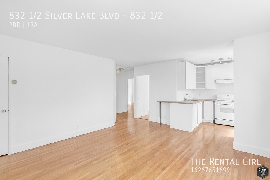 Primary Photo - Bright & Airy Upper Unit | Cozy 2 Bedroom/...