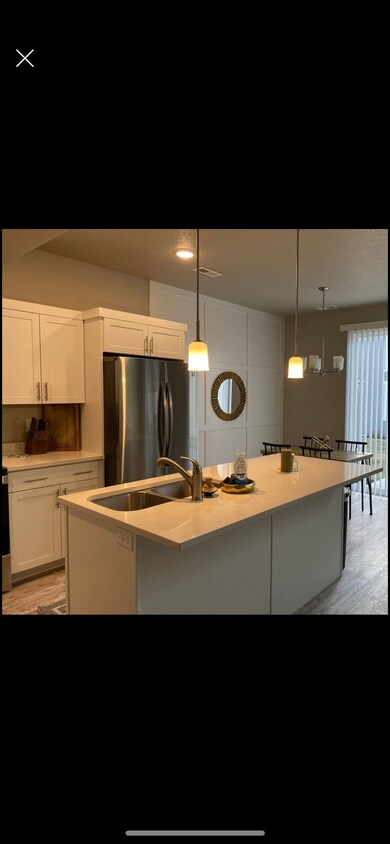 large kitchen with lots of storage, large pantry and fridge. - 1908 S 1080 W