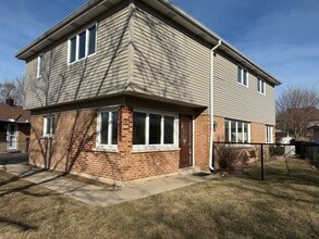 Building Photo - 10017 S 52nd Ave